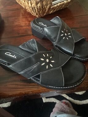 Clarks Black Leather Slip-On Mules with Floral Cutouts